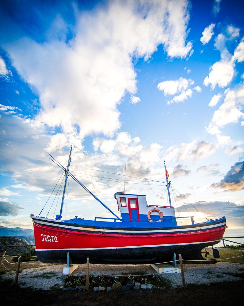 colorful boat on the cliffs