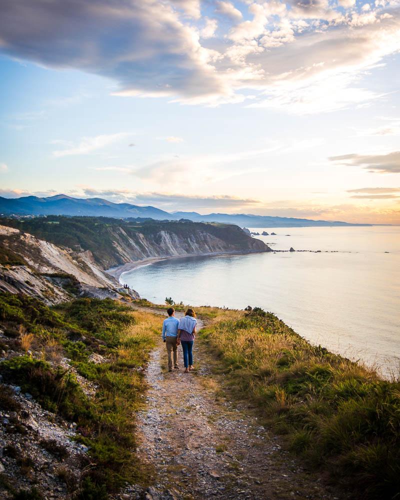 couple walking on the cliff