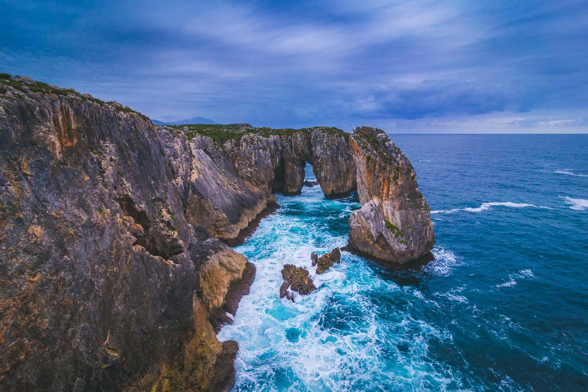 massive rock in the sea in bufones de pria