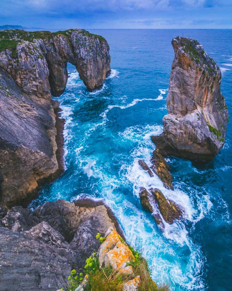 sea stack and natural bridge in bufones de pria asturias spain