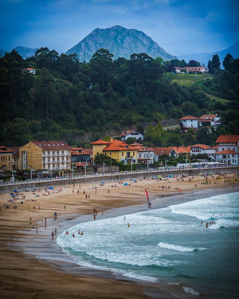 playa de santa marina with the mountains in ribadesella