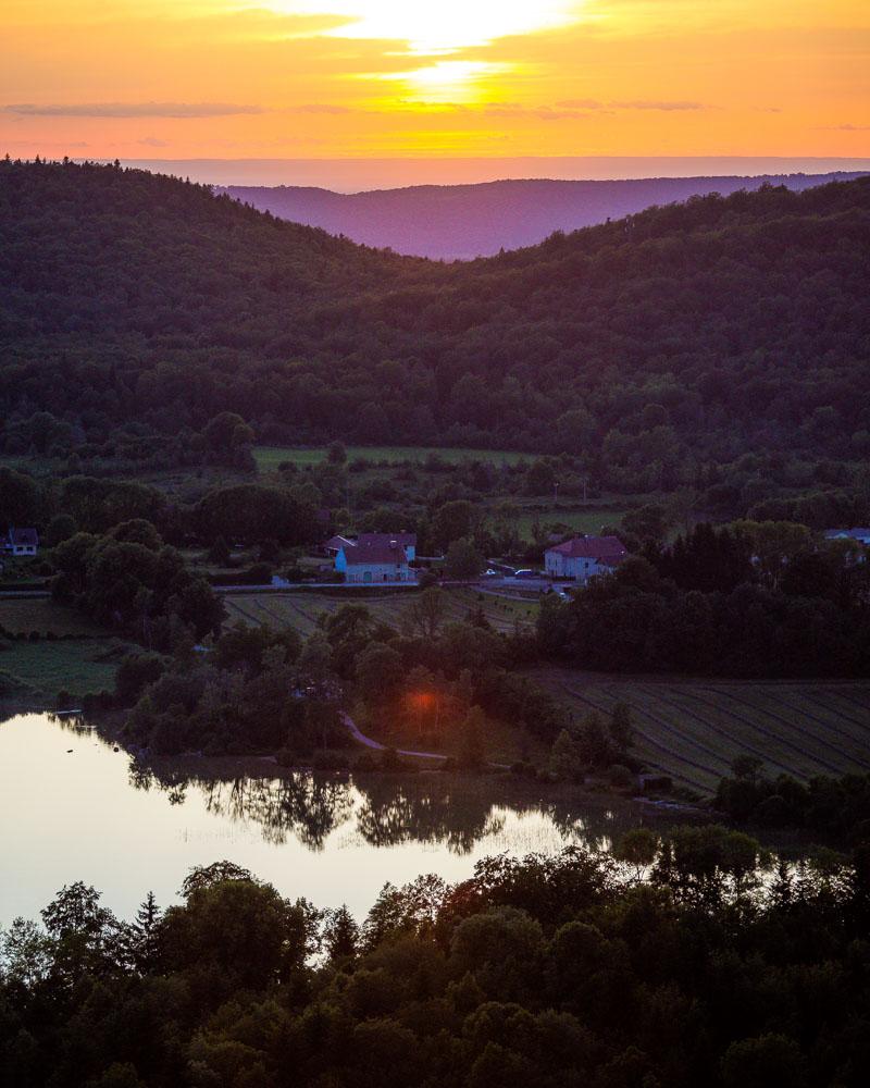 sunset over the lac d'ilay vertical version