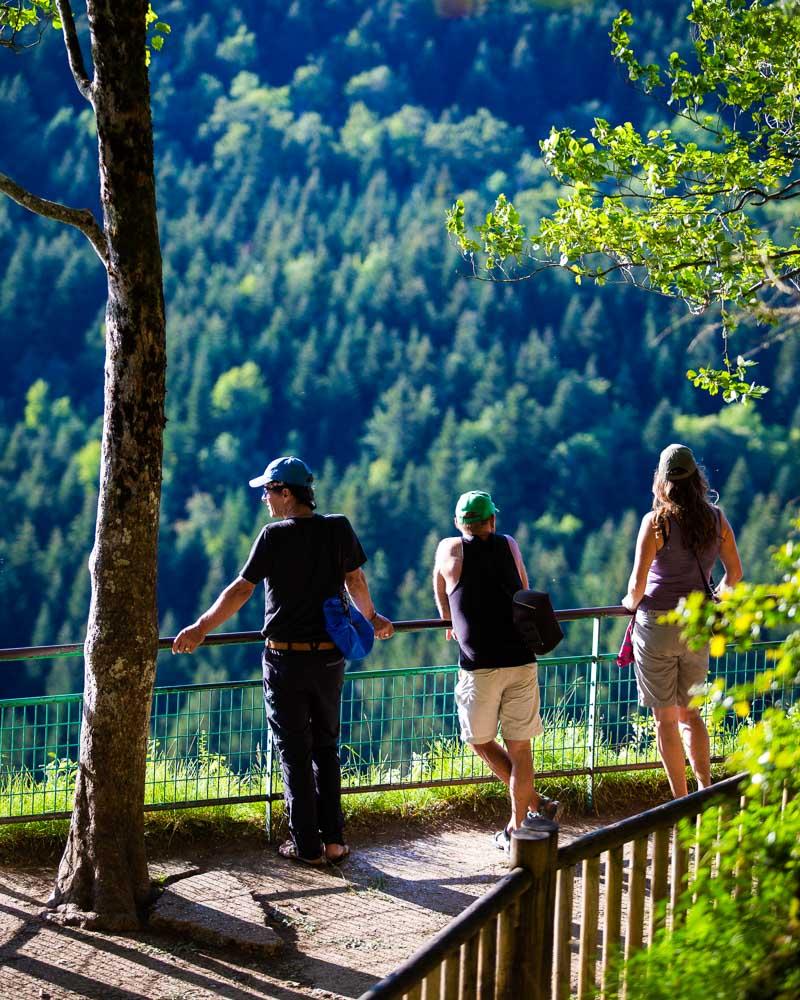 hikers enjoying the view at the belvedere des 4 lacs