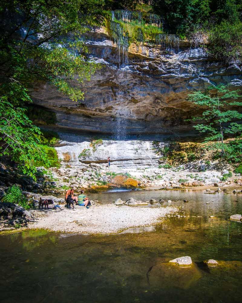 people swimming in cascade saut girard jura