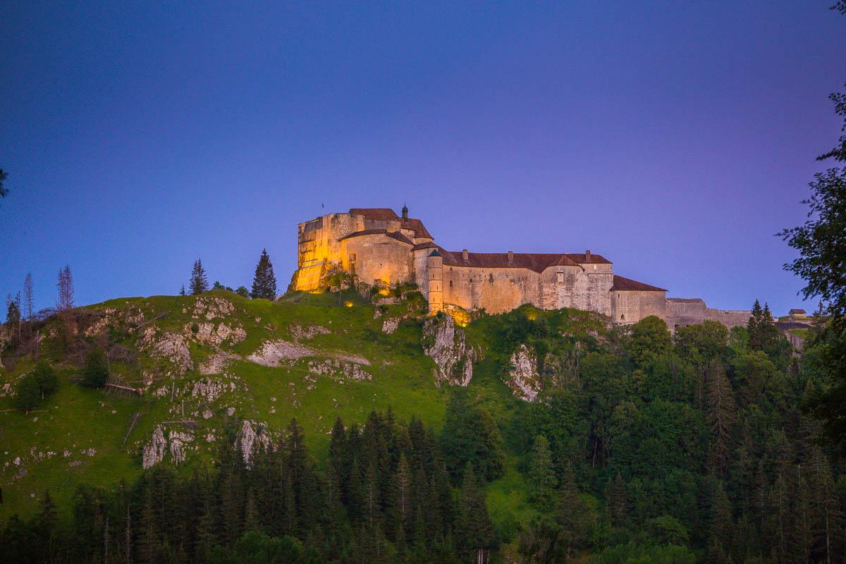 chateau de joux at night