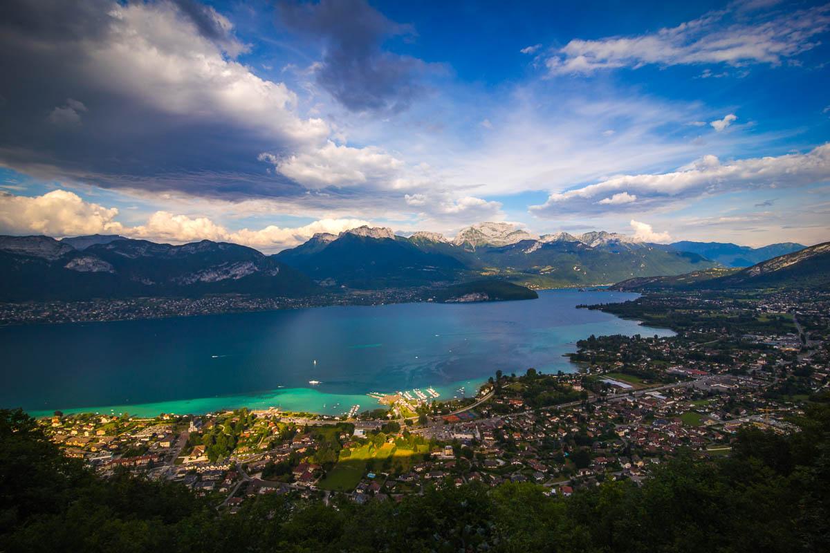 late afternoon light over annecy mountains and lac d'annecy
