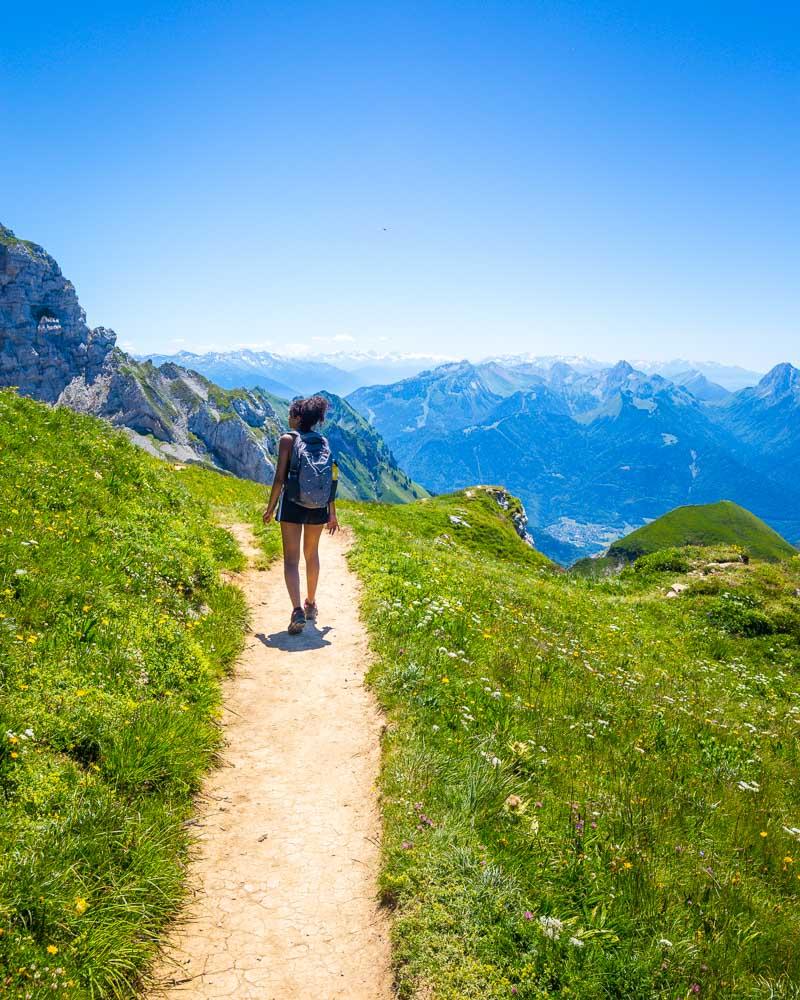 nesrine on trail near the summit