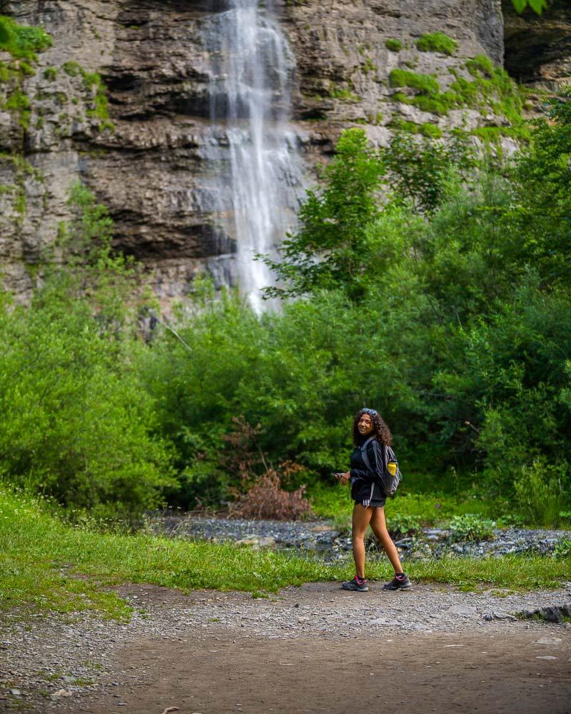 nesrine in front of big waterfall
