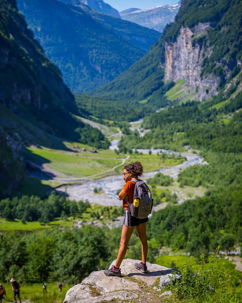 nesrine on top of the bout du monde hike