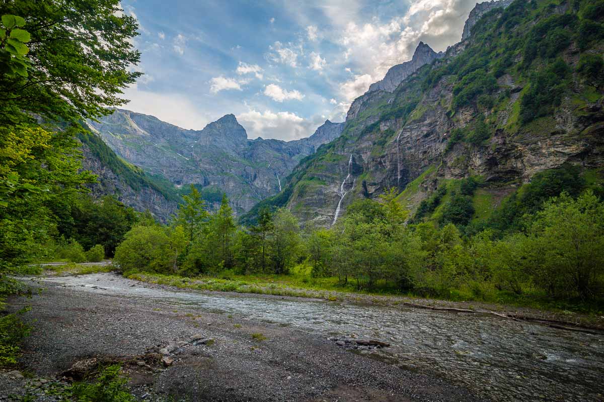 the giffre river below the cirque du fer a cheval mountains