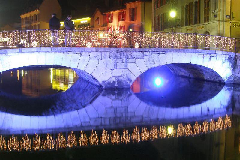 light on bridge in annecy france winter