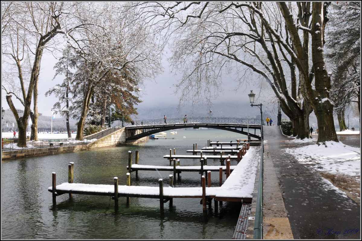 snow around the canal in annecy in winter
