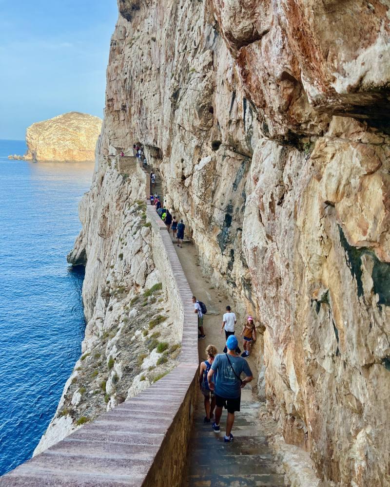 3 - people going down the stairs