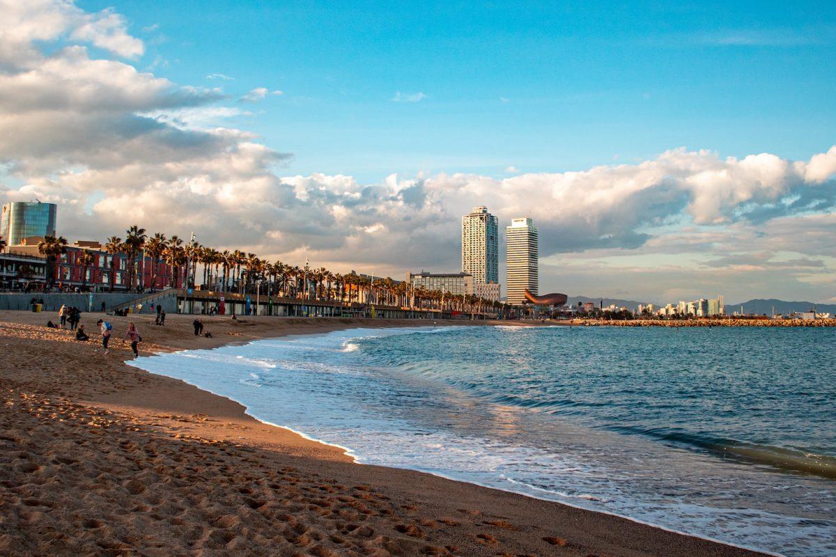 barcelona weather in winter is nice enough to enjoy strolling at barceloneta beach