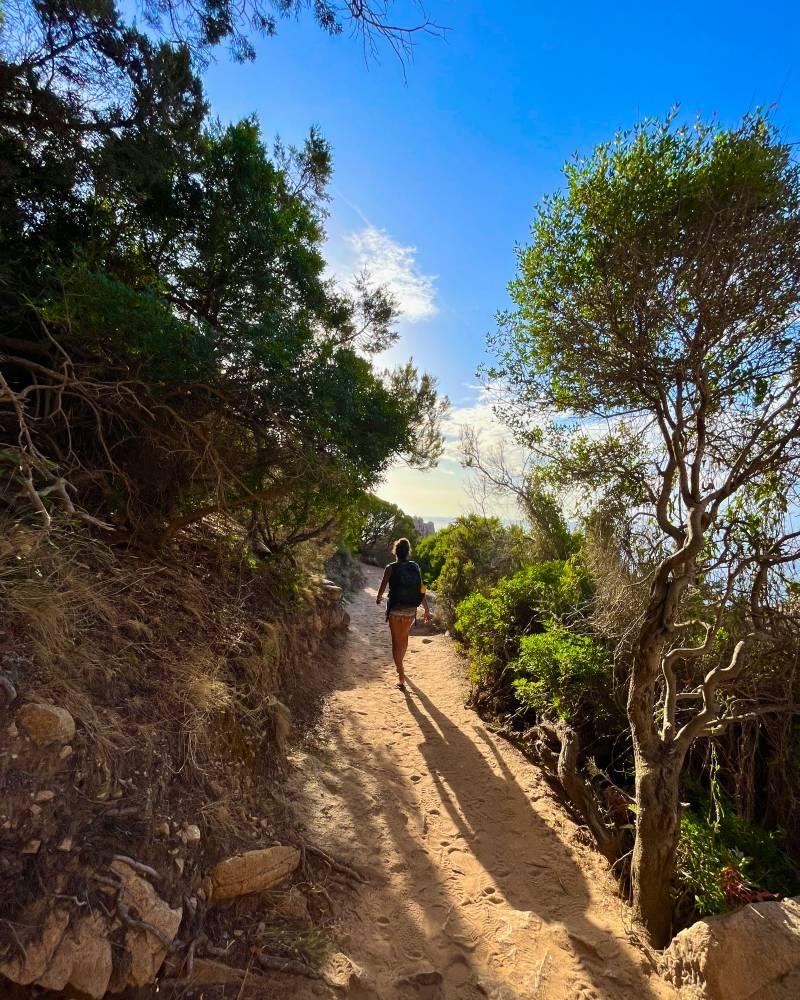 nesrine walking in the bush to cala li cossi