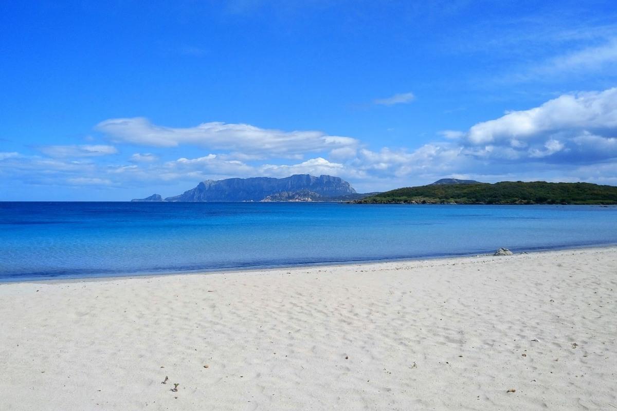 relaxing at spiaggia pittulongu is in the top olbia sardinia things to do