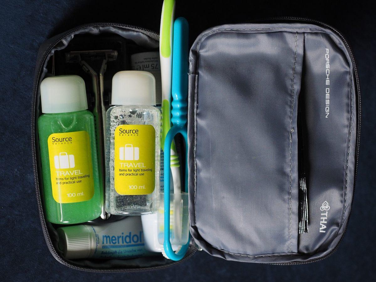 travel sized containers is the best way to pack a suitcase to save space