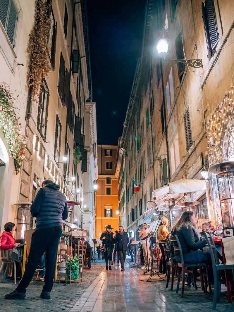 rome street full of restaurants