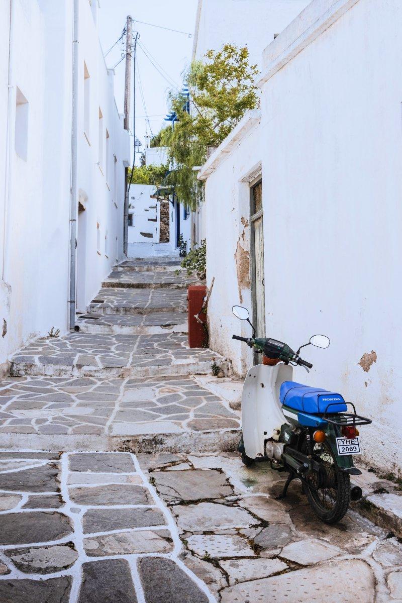 scooters and buses in paros