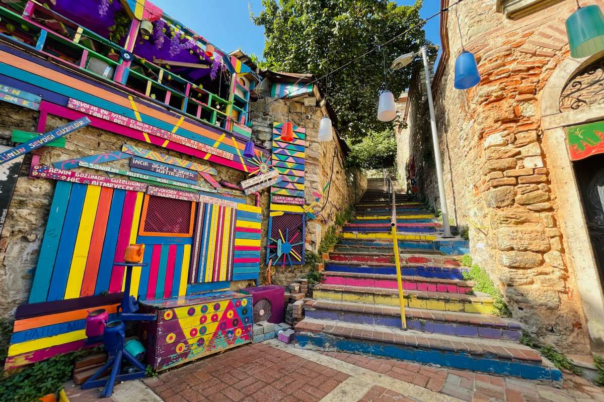 climbing the colorful stairs is in the best balat things to do